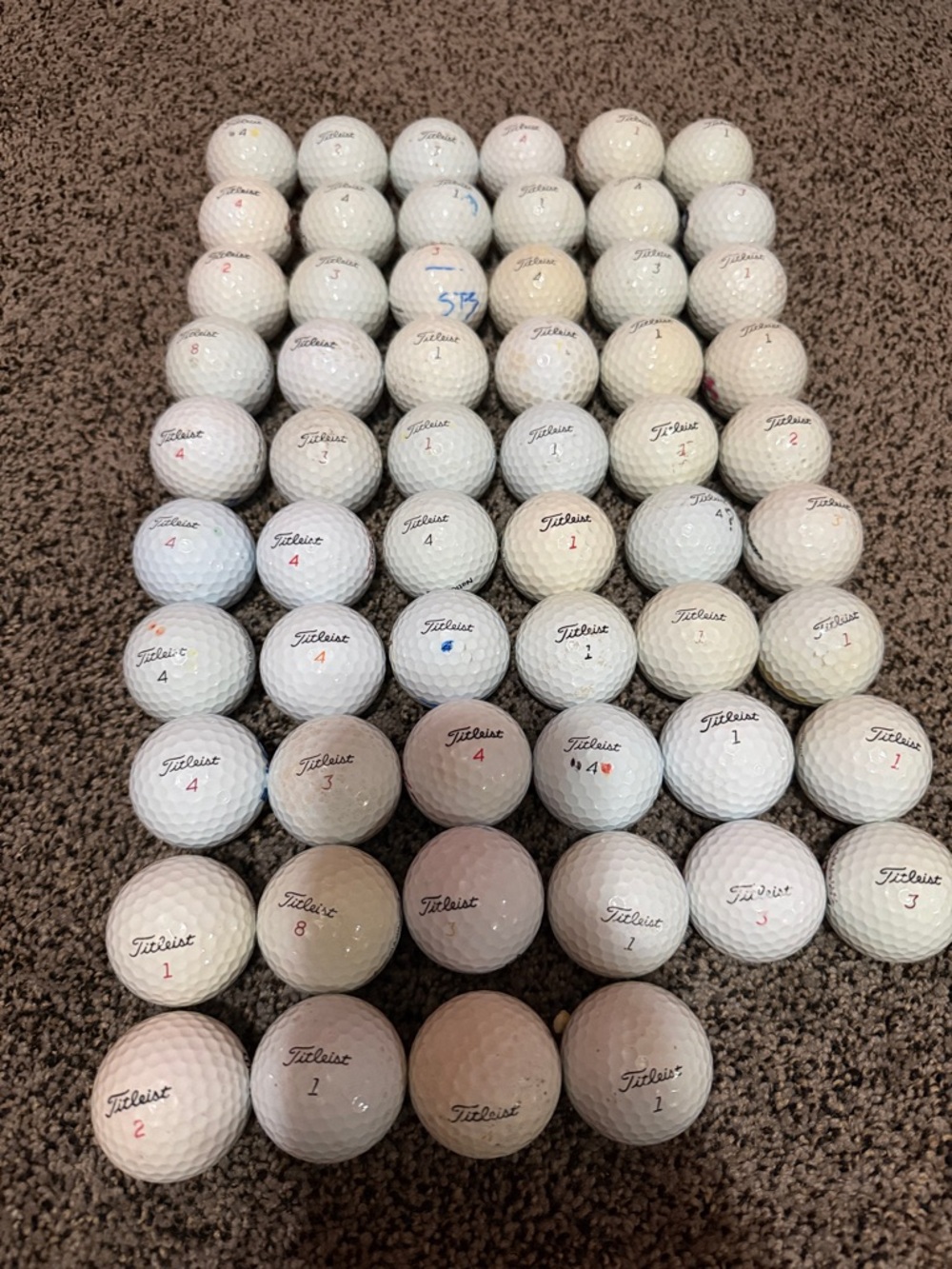58 Titleist White Golf Balls- cleaned and playable condition